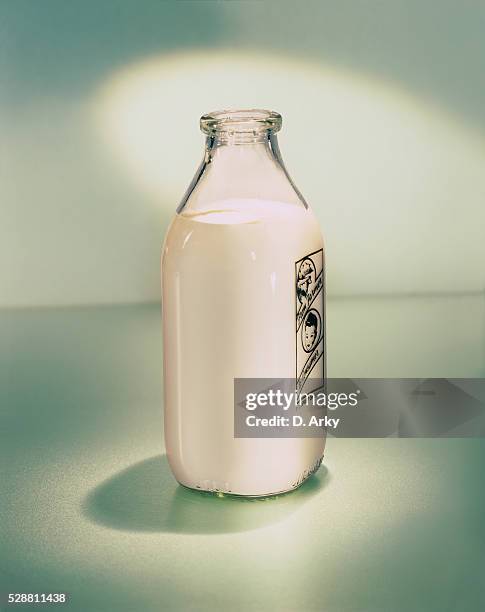 a bottle of milk - botella de leche fotografías e imágenes de stock