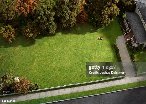 aerial view of suburban home. - mowing lawn stock pictures, royalty-free photos & images