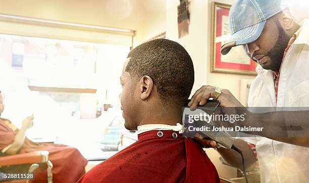 barber at work - joshua dalsimer stock pictures, royalty-free photos & images