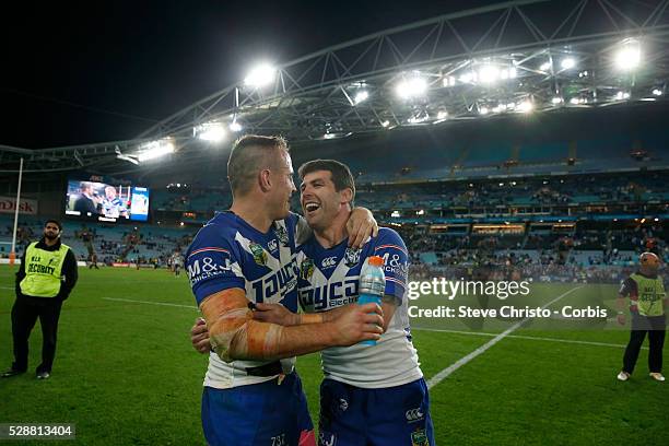 Bulldogs Michael Ennis celebrates with Josh Reynolds and fans after the Preliminary Final against the Panthers at ANZ Stadium. Sydney, Australia....