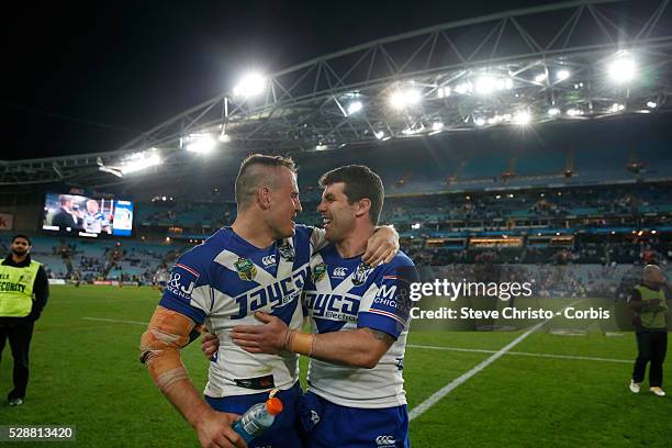 Bulldogs Michael Ennis celebrates with Josh Reynolds and fans after the Preliminary Final against the Panthers at ANZ Stadium. Sydney, Australia....