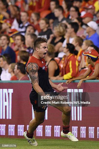 Ben Kennedy of the Demons celebrates kicking a goal during the round seven AFL match between the Gold Coast Suns and the Melbourne Demons at Metricon...