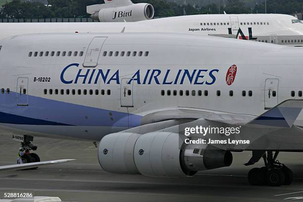 China Airlines plane sits on the tarmac at Pudong International Airport.