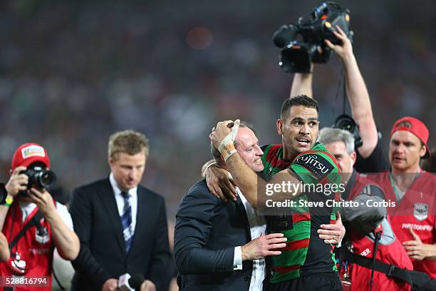 Rabbitohs Greg Inglis and coach Michael Maguire after beating the Bulldogs 30 to 6 during the NRL Grand Final match at ANZ Stadium 2014. Sydney,...