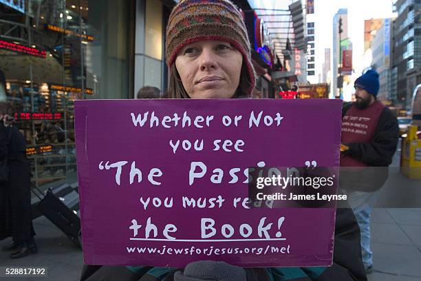 Member of "Jews for Jesus" pickets in Times Square near a movie theater where Mel Gibson's "The Passion of the Christ" was playing.