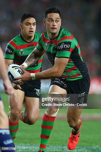 Rabbitohs captain John Sutton runs the Bulldogs defensive line during the NRL Grand Final match at ANZ Stadium 2014. Sydney, Australia. Sunday 5th...