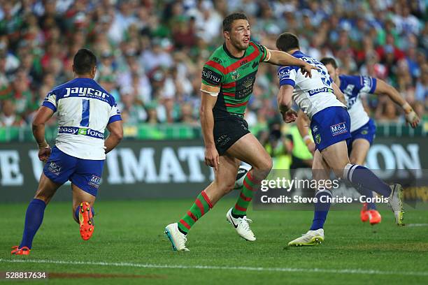 Rabbitohs Sam Burgess complains to referee Shayne Hayne after his treatment in a tackle from Bulldogs Sam Perrett during the NRL Grand Final match at...