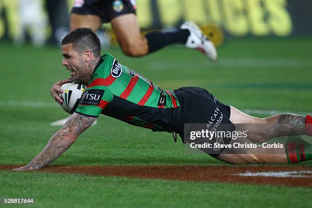 Rabbitohs Adam Reynolds scores a try and celebrates with captain John Sutton during the NRL Grand Final match against the Bulldogs at ANZ Stadium...