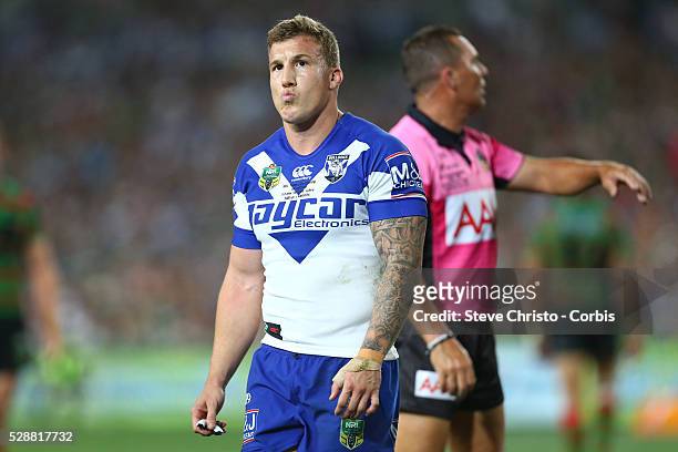 Bulldogs Trent Hodkinson feels the game slipping away during the NRL Grand Final match against the Rabbitohs at ANZ Stadium 2014. Sydney, Australia....