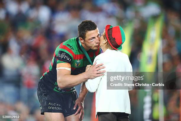 Rabbitohs Sam Burgess receives the Clive Churchill medal after the NRL Grand Final match against the Bulldogs at ANZ Stadium 2014. Sydney, Australia....