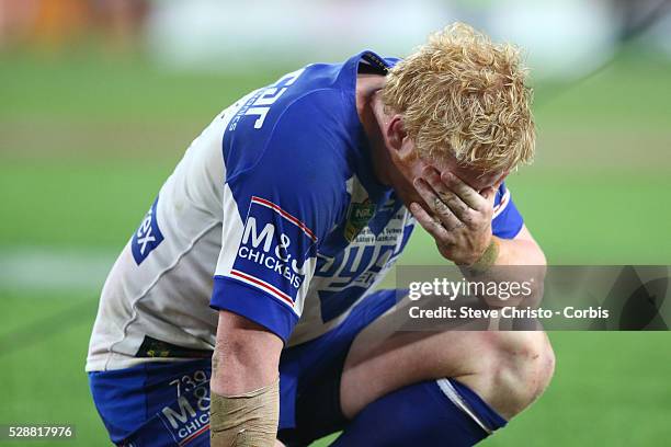 Bulldogs James Graham shows his disappointment after losing to the Rabbitohs in the NRL Grand Final match at ANZ Stadium 2014. Sydney, Australia....