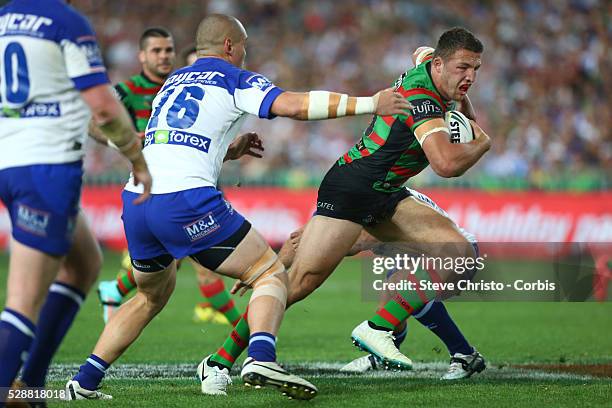 Rabbitohs Sam Burgess heads for the try line through some paper thin defence from Bulldogs Dale Finucane during the NRL Grand Final match at ANZ...