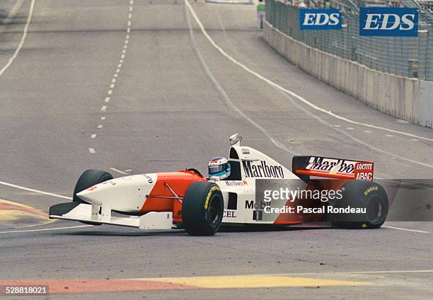 Mika Hakkinen of Finland suffers a left rear puncture leading to a serious accident as he drives the Marlboro McLaren Mercedes McLaren MP4-10...