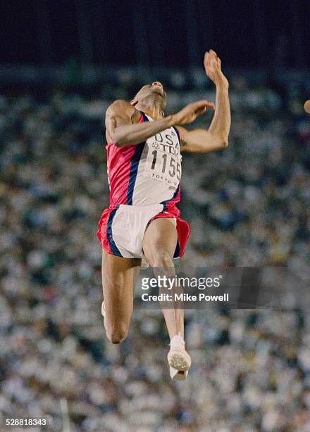Mike Powell of the United State making his world record leap during the Long Jump event at the IAAF World Athletic Championships on 30th August 1991...