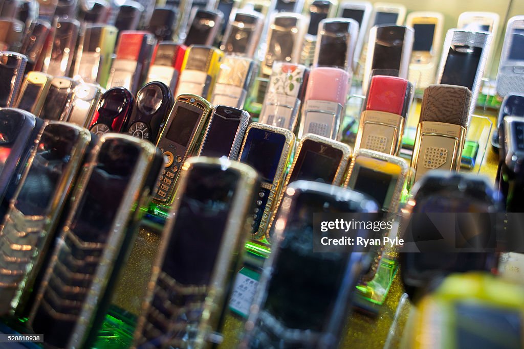 China - Industry - Business - Fake Phones - Rows of Fake Branded Mobile Phones