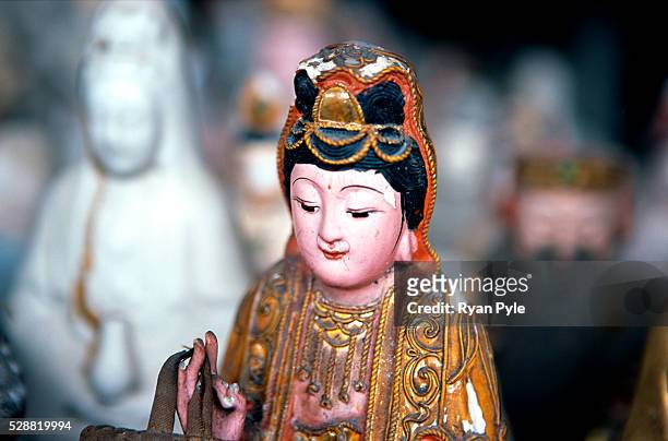 Buddha statue at the Nanputuo Temple in Xiamen. The Nanputuo Temple is located on the southeast of Xiamen Island. It is surrounded by the graceful...