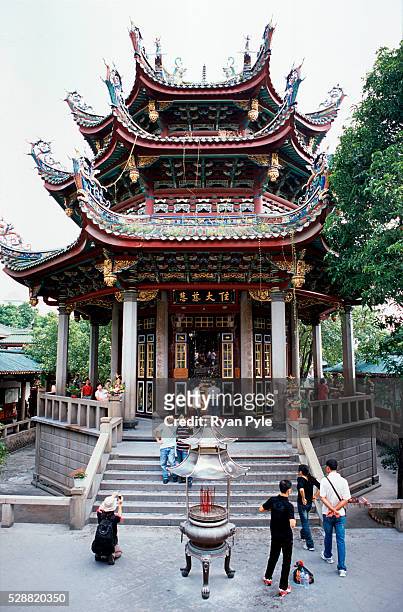 The Hall of Great Benevolence at the Nanputuo Temple in Xiamen. The Nanputuo Temple is located on the southeast of Xiamen Island. It is surrounded by...