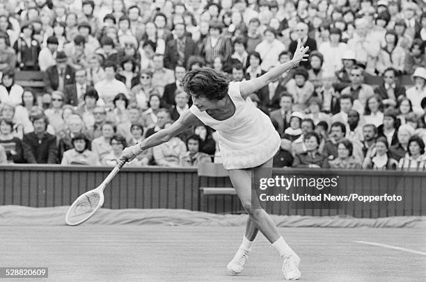 English tennis player Virginia Wade pictured in action during her first round match with Elizabeth Ekblom at Wimbledon Lawn Tennis Championships in...