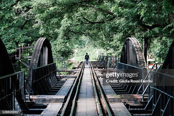 walking on the bridge - thailandia stock pictures, royalty-free photos & images