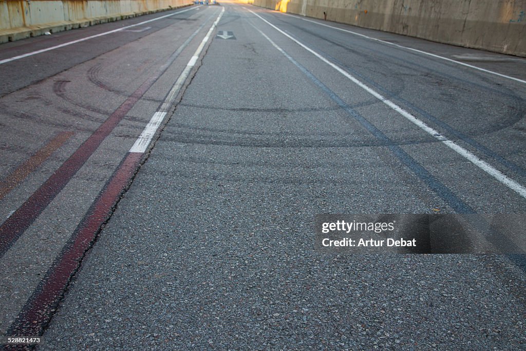 Tyre skid-marks on road in the Barcelona harbor