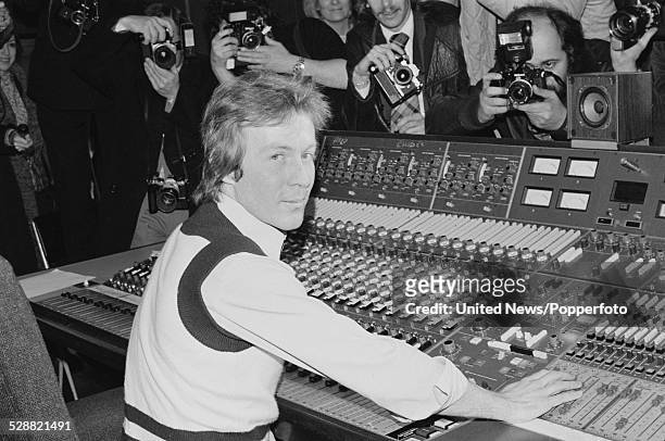 British gardener and singer, Roddy Llewellyn pictured at a press photo call sitting at a mixing desk in a recording studio during the recording of...