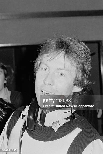 British gardener and singer, Roddy Llewellyn pictured at a press photo call wearing headphones in a recording studio during the recording of his...