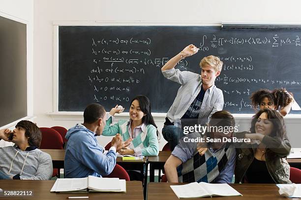 students goofing off in classroom - student uprising stock pictures, royalty-free photos & images