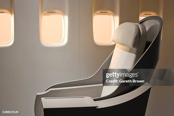 airplane windows and chair - 乗り物内部 ストックフォトと画像