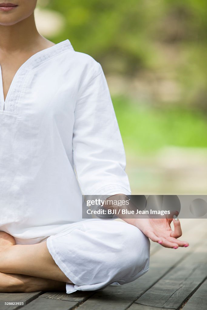 Young woman practicing yoga