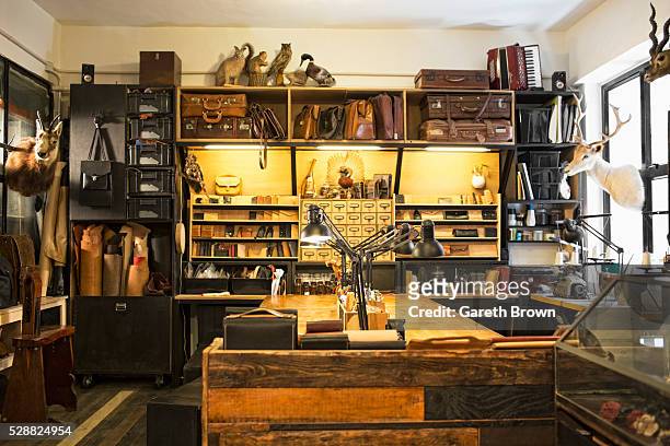 leather workshop interior - leather craft stock pictures, royalty-free photos & images