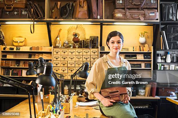 young craftswoman - leather craft stock pictures, royalty-free photos & images