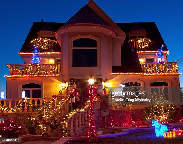 luxury brooklyn house with christmas lights at sunset, new york. - dyker heights stock pictures, royalty-free photos & images