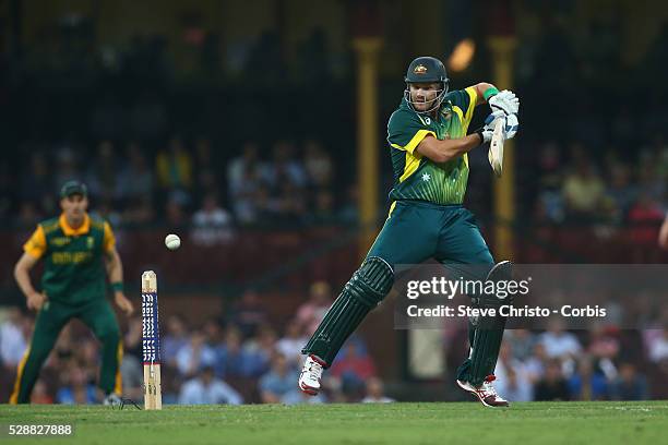 Australia's Shane Watson plays the ball down off the bowling of South Africa's Wayne Parnell at the Sydney Cricket Ground. Sydney, Australia. Sunday...