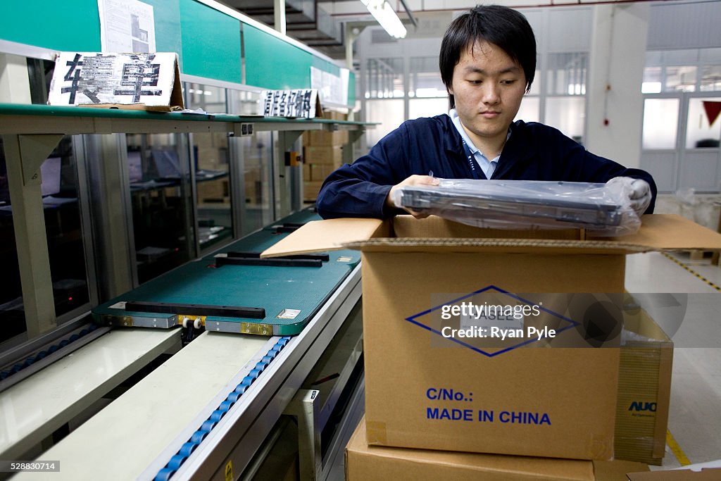 China - Guangdong - Shenzhen - Computer - Workers Assemble Laptop Computers