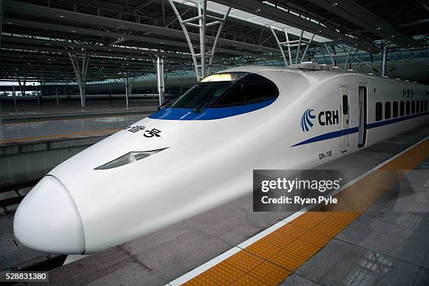 Looking at the front of a "bullet train" parked at the new Shanghai Hongqiao high speed Train Station in Shanghai, China. The train station was built...