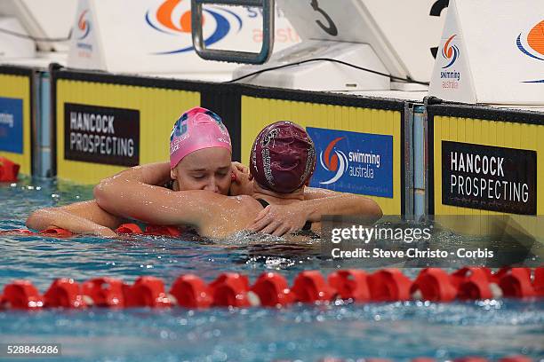 Tessa Wallace hugs Keryn McMaster after combating in the Women's 400m Individual Medley during the Hancock Prospecting Australian Swimming...