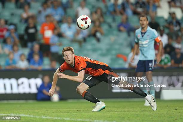 Brisbane Roars Corey Brown heads the ball back to the keeper against Sydney FC at Allianz Stadium. Sydney, Australia. Friday 14th March 2014.