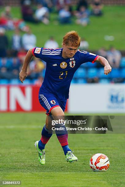 Japan's Gotoku Sakai has a shot a goal against Palestine at Newcastle Stadium. Sydney Australia. Monday, 12th January 2015 .