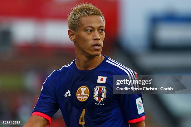 Japan's Keisuke Honda walks to take a corner against Palestine at Newcastle Stadium. Sydney Australia. Monday, 12th January 2015 .