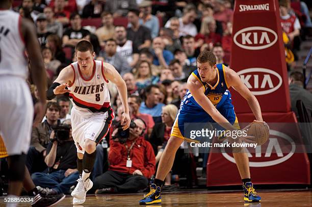 David Lee, a Golden State Warrior, gets ahold of the ball at a game versus the Portland Trail Blazers. The Trail Blazers won 90 to 87.