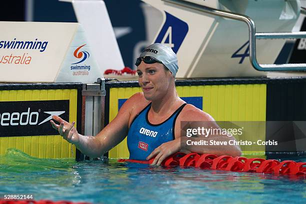 Women's 50m Backstroke final winner Emily Seebohm is congratulated by Megan Nayafter the race at the Brisbane Aquatic Centre. Brisbane, Australia....