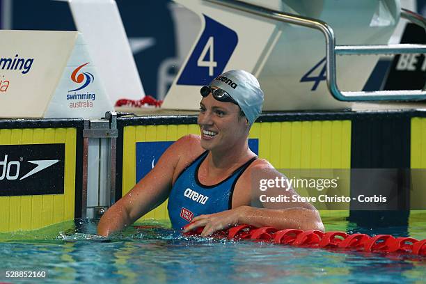 Women's 50m Backstroke final winner Emily Seebohm is congratulated by Megan Nayafter the race at the Brisbane Aquatic Centre. Brisbane, Australia....