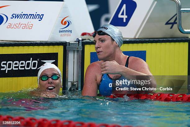 Women's 50m Backstroke final winner Emily Seebohm is congratulated by Megan Nayafter the race at the Brisbane Aquatic Centre. Brisbane, Australia....