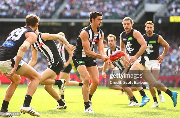 Scott Pendlebury of the Magpies runs with the ball during the round seven AFL match between the Collingwood Magpies and the Carlton Blues at...