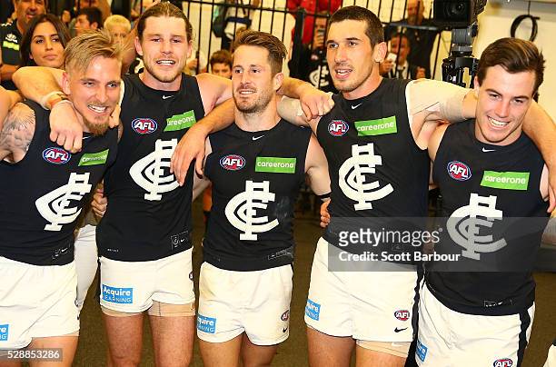 Bryce Gibbs of the Blues and his teammates sing the team song in the changing rooms after the Blues won the round seven AFL match between the...