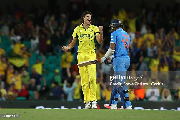 Australia's Mitchell Starc celebrates the last wicket of India's Umesh Yadav to take Australia to the final at the Sydney Cricket Ground , Australia....