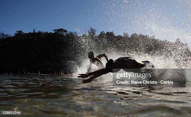 Swimmers take part in the shorter swim runs from Shelly Beach, across Cabbage Tree Bay, around Manly Point and into Manly beach. This takes the...