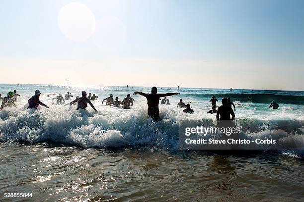 Swimmers take part in a circuit course, from Manly Beach, out by Fairy Bower point and over the reef, around the point, along Shelley Beach, around...