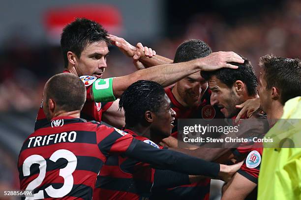 Wanderers Labinot Haliti celebrates his goal against Guizhou Renhe with teammates Jason Trifiro, Kwabena Appiah, Michael Beauchamp, Iacopo La Rocca...