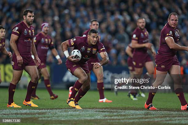 Maroon's Justin Hodges takes the ball up during the match against the Blues at Sydney Olympic Park. Sydney, Australia. Wednesday, 27th May 2015